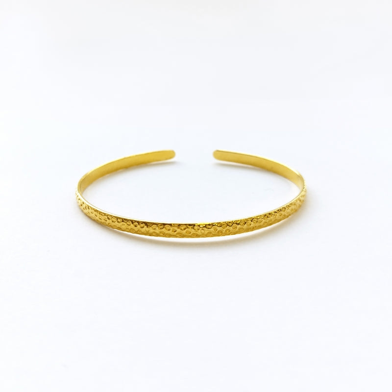 Saturn’s minimal bangle Gold