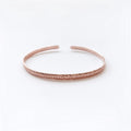 Saturn’s minimal bangle Rose Gold