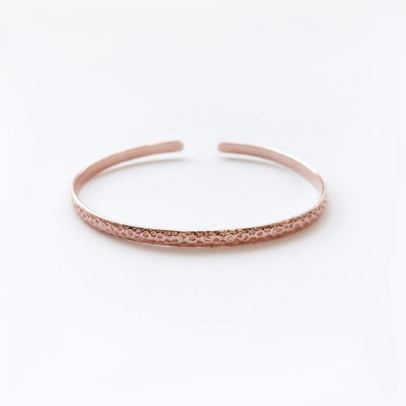 Saturn’s minimal bangle Rose Gold