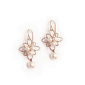 A cloud of pearls earrings rose gold